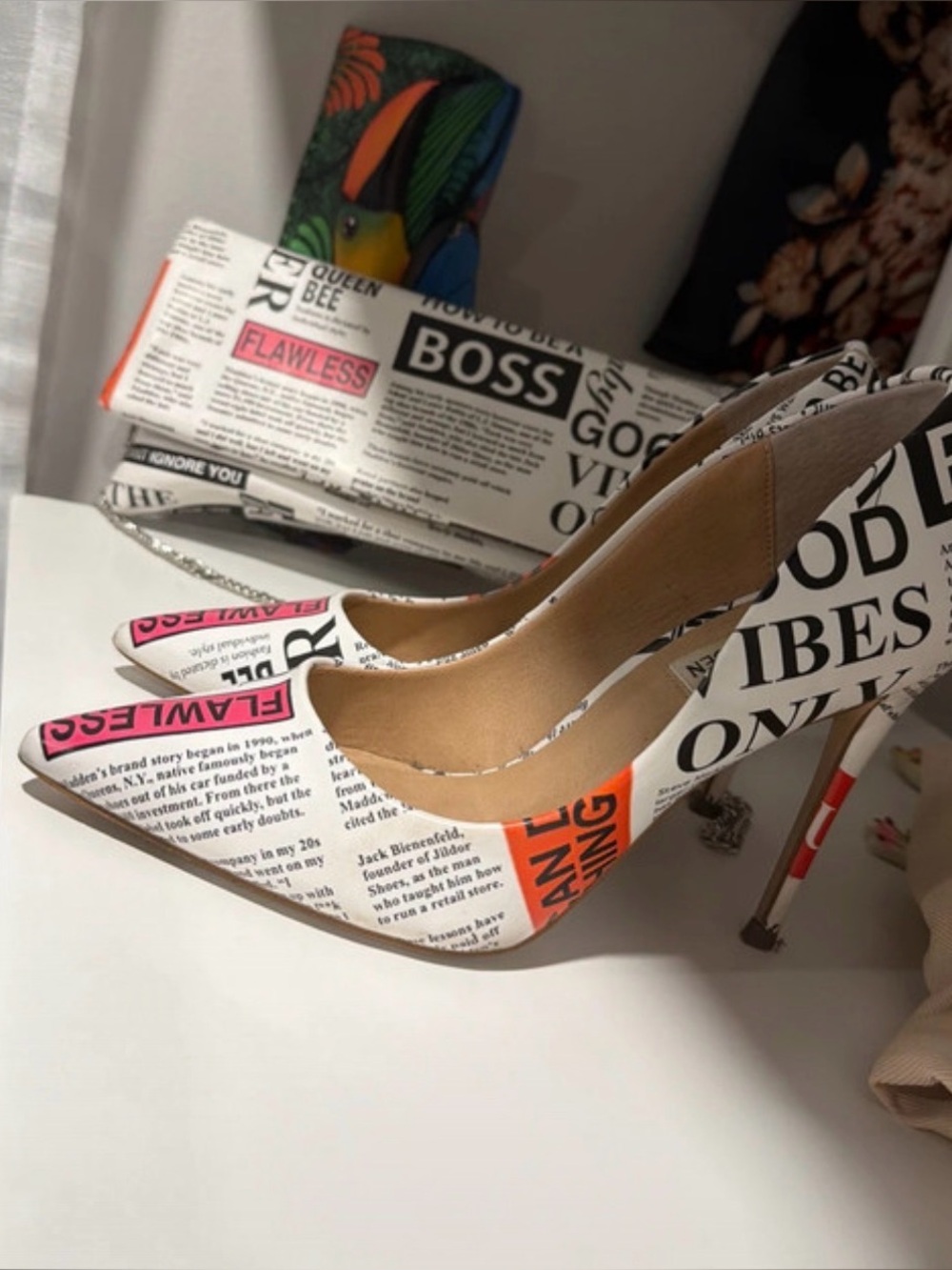 Newspaper Pointed Toe Stiletto Pumps in White and Black including matching purse